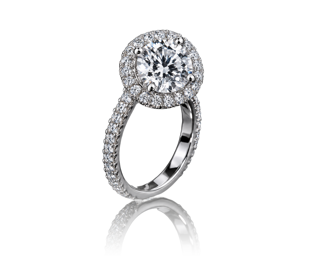 Round brilliant diamond halo ring in white gold